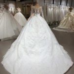 مدل لباس عروس ژورنالی دامن دنباله دار با چین زیاد
