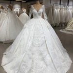 مدل لباس عروس ژورنالی با دامن دوتیکه و آستین بلند 2019