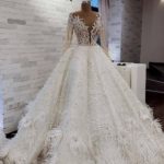 مدل لباس عروس ژورنالی با دامن پر دار